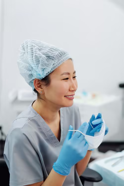 Young Asian-Australian medical professional in a modern clinical setting