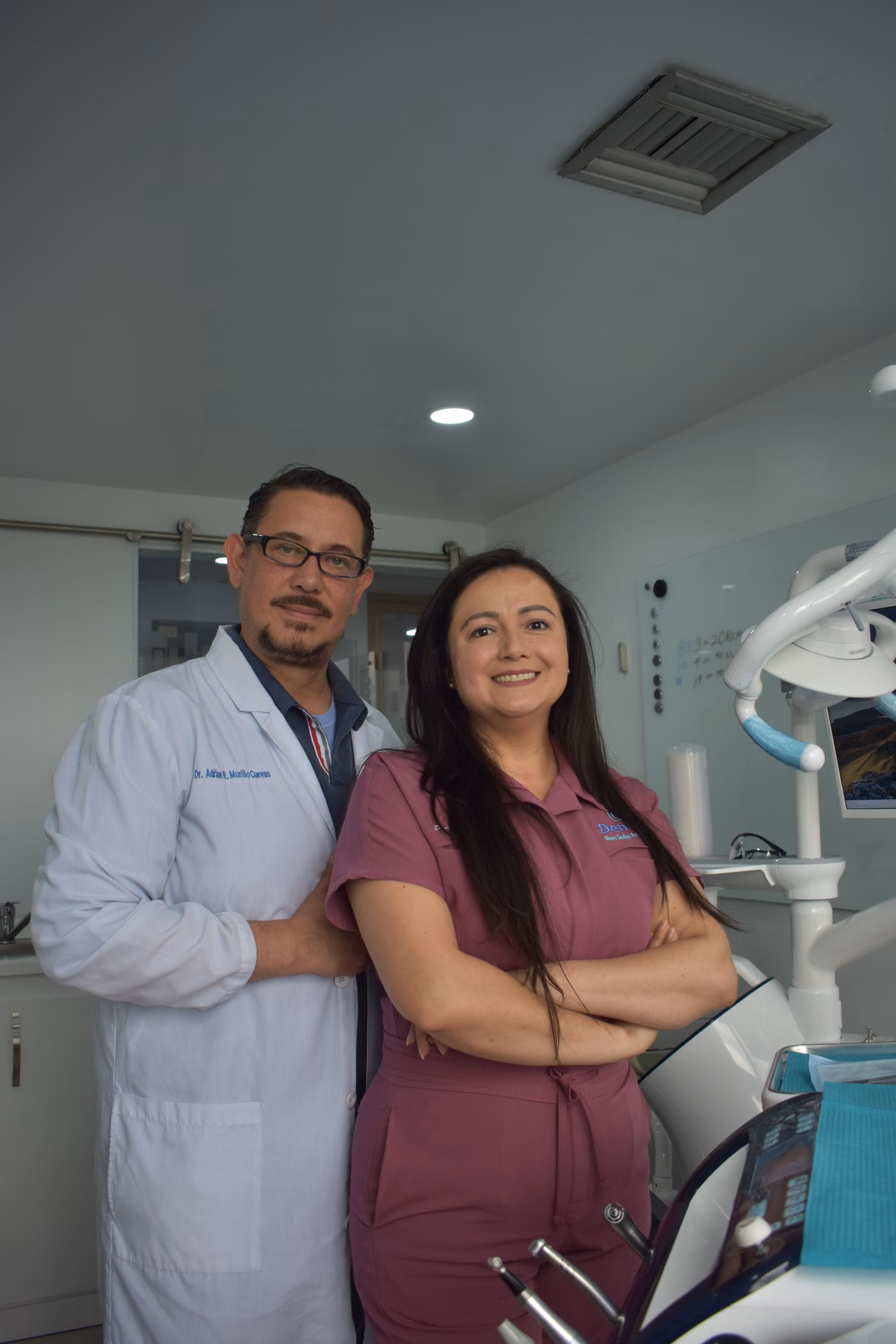 Dentist and assistant in a modern dental clinic